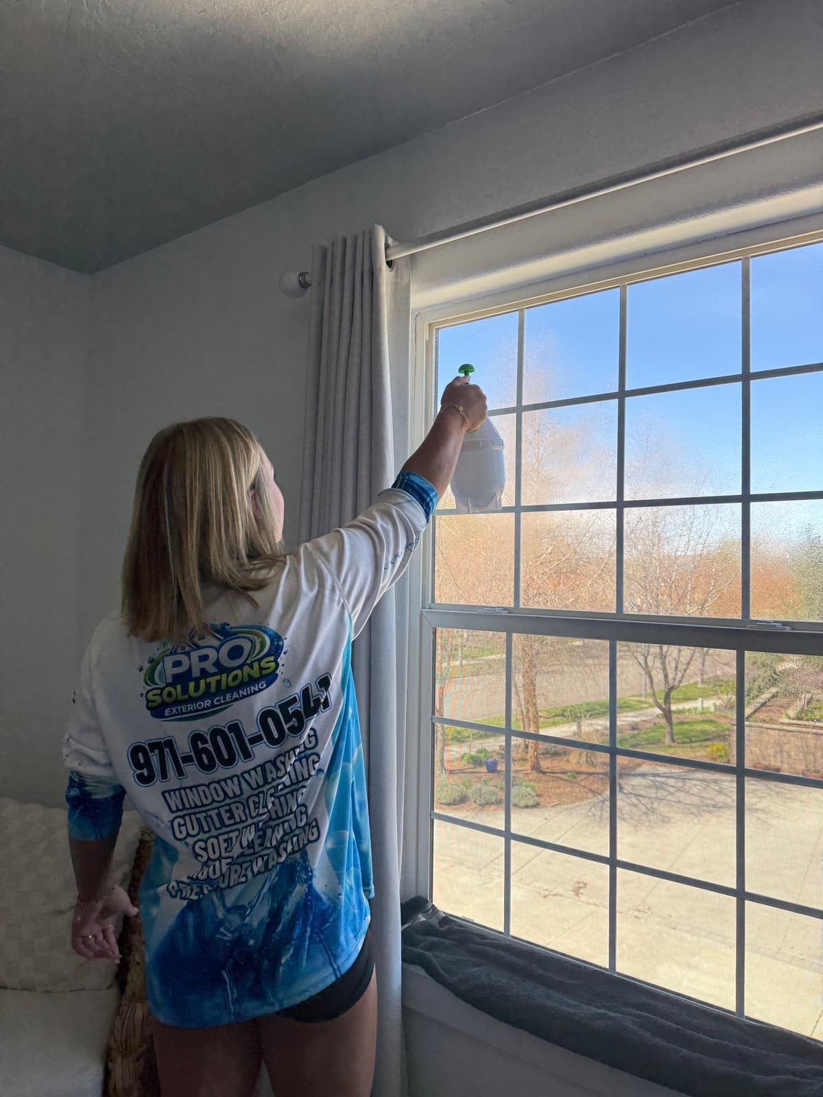 Hand-detailing interior glass, streak-free