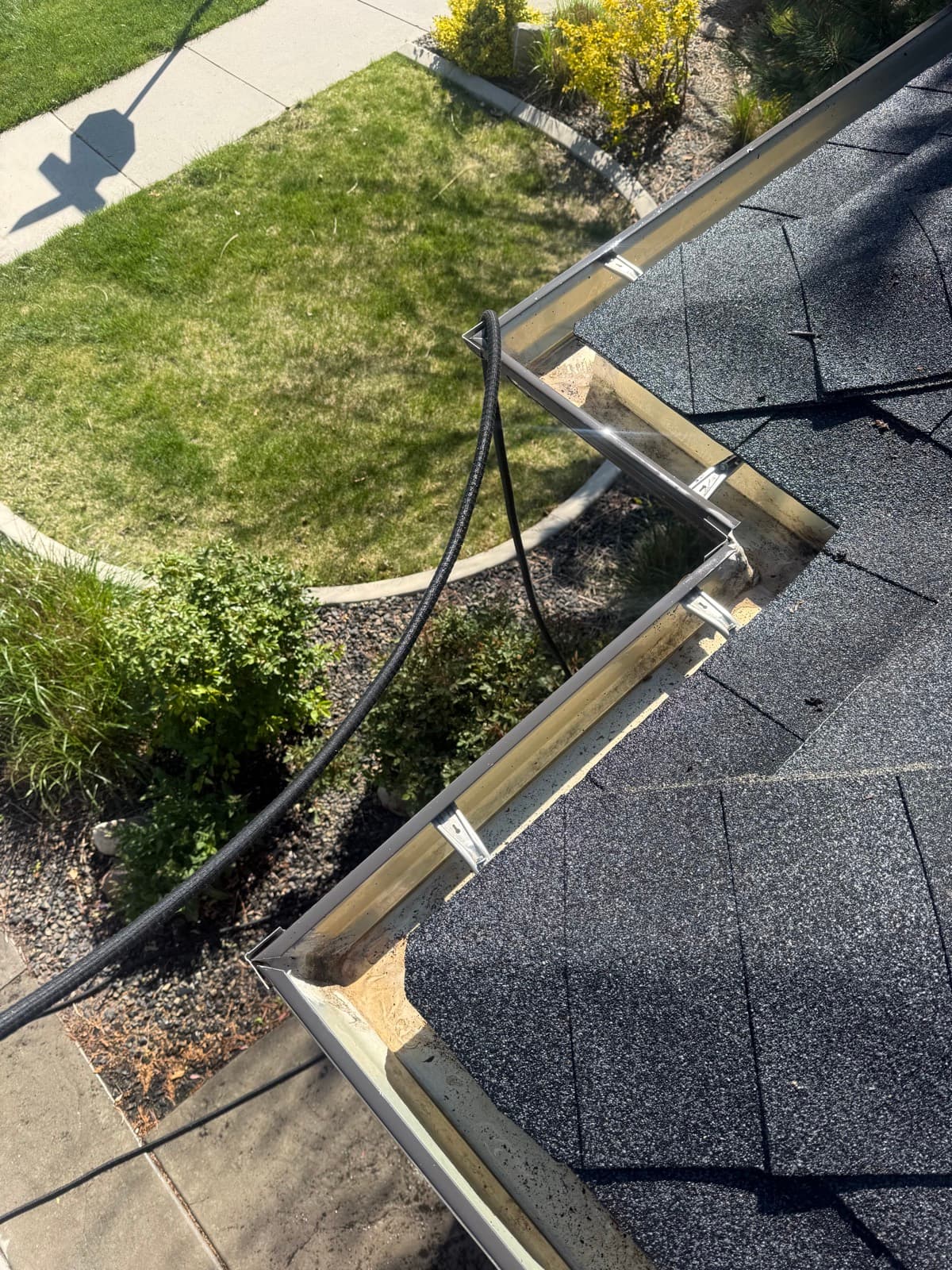 Gutter cleared, flushed, and flow-tested
