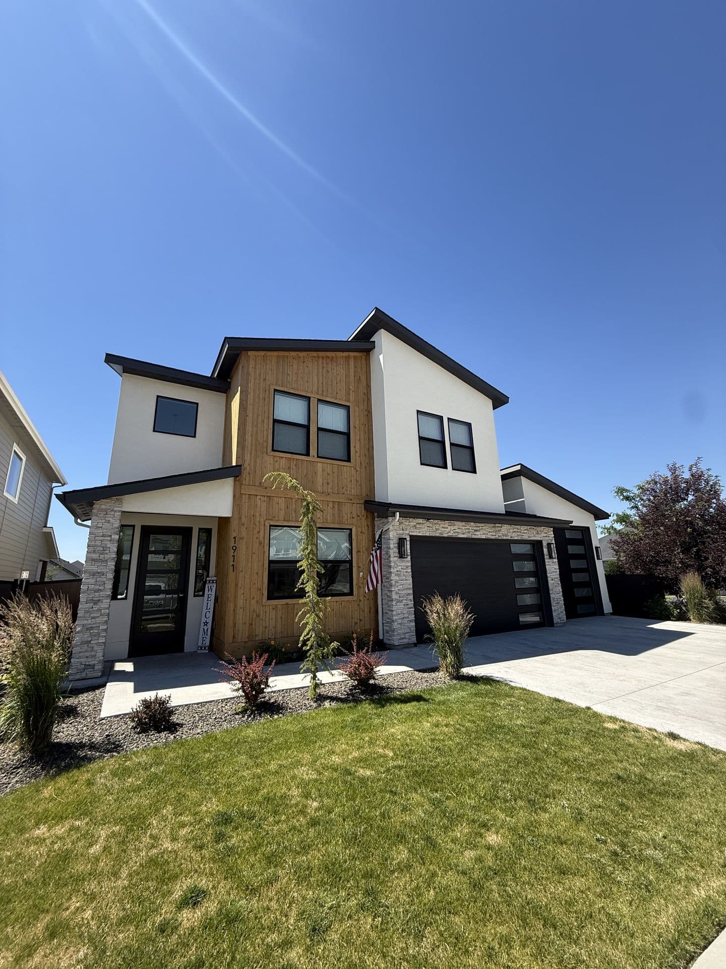 Two-story modern Boise home with clean rooflines ready for holiday lighting