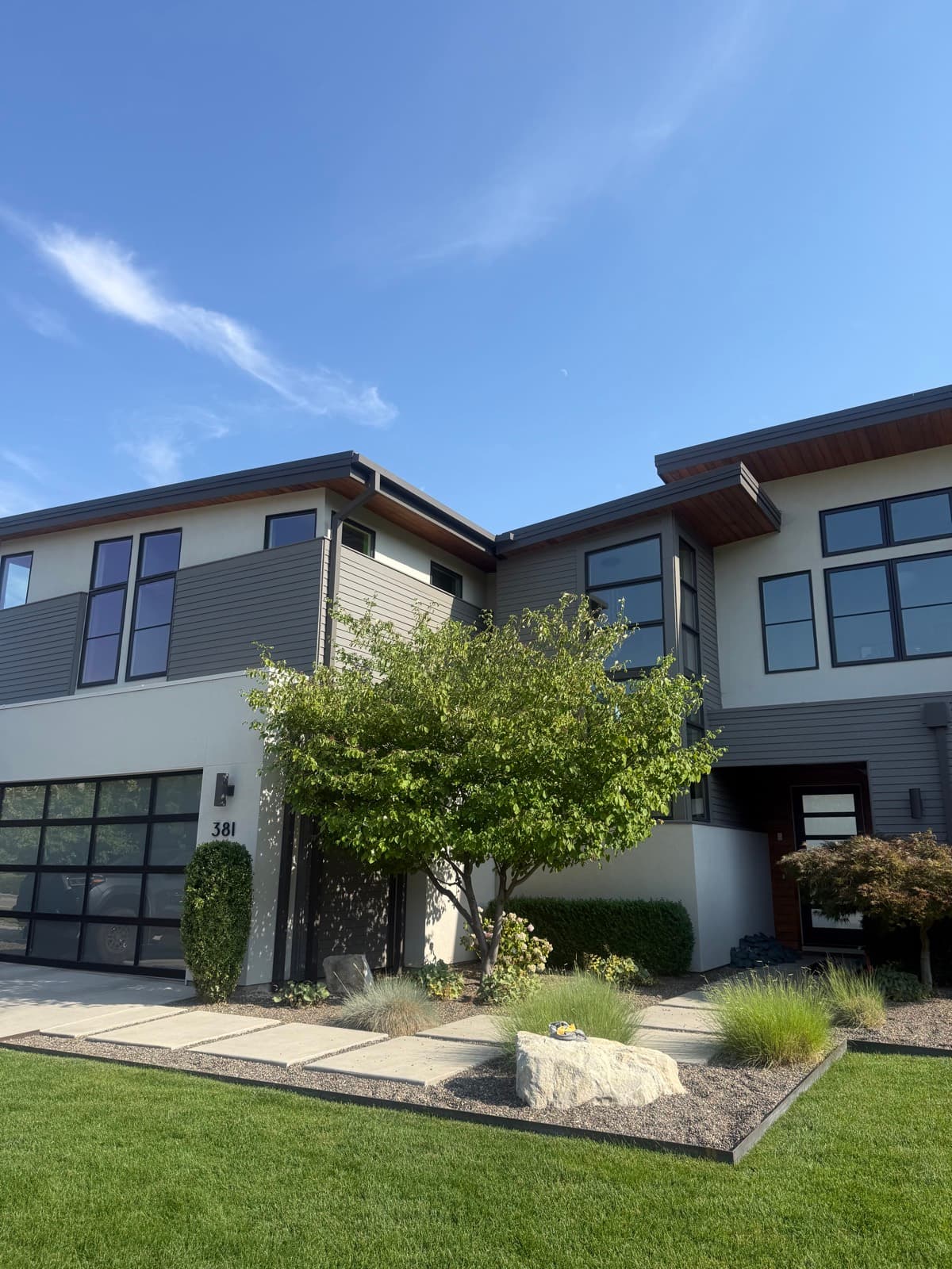Modern Boise home with black-frame windows after a soft wash